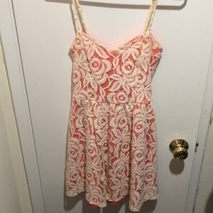 Light pink mini dress with white lace detail